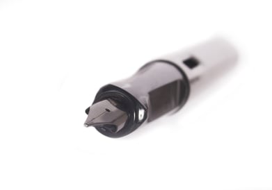 Fountain pen in perspective over white